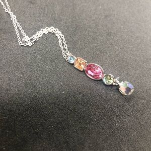 NWT Swarovski Crystals necklace. This has 5 crystals. 16” chain w/ 2”adjustment